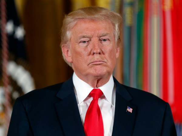 President Donald Trump stands as he waits to bestow the nation's highest military honor, the Medal of Honor to retired Army medic James McCloughan during a ceremony in the East Room of the White House in Washington, Monday, July 31, 2017. McCloughan is credited with saving the lives of members of his platoon nearly 50 years ago in the Battle of Nui Yon Hill in Vietnam. (AP Photo/Pablo Martinez Monsivais)