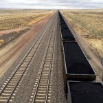 A train near hauls coal mined from Wyoming's Powder River Basin near Bill, Wyo., Tuesday, March 28, 2017. President Donald Trump's lifting of a federal coal leasing moratorium issued last year by President Barack Obama will allow new leasing of federal coal to resume in the basin and elsewhere. (AP photo/Mead Gruver)