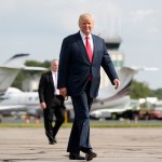 President Donald Trump Boards Air Force One at Morristown Municipal Airport, Monday, Aug. 14, 2017 in Morristown, N.J. Trump is traveling back to White House to sign an executive order at the White House and then later today travels to New York City and will stay through Wednesday. (AP Photo/Pablo Martinez Monsivais)