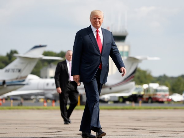 President Donald Trump Boards Air Force One at Morristown Municipal Airport, Monday, Aug. 14, 2017 in Morristown, N.J. Trump is traveling back to White House to sign an executive order at the White House and then later today travels to New York City and will stay through Wednesday. (AP Photo/Pablo Martinez Monsivais)