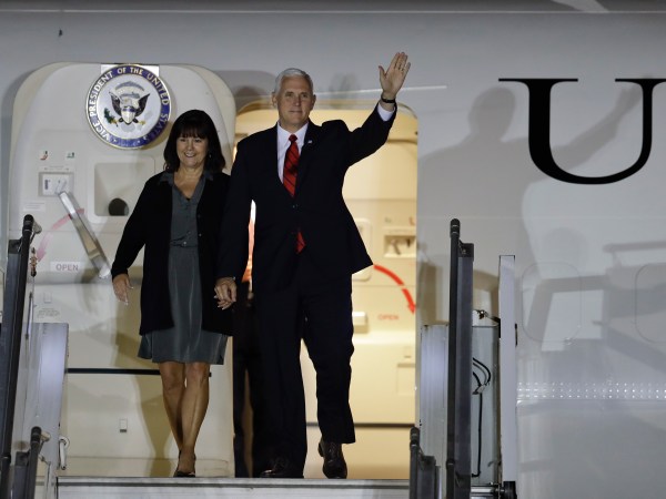 U.S. Vice President Mike Pence and his wife Karen Pence arrive in Buenos Aires, Argentina, Monday, Aug. 14, 2017. Pence will be in Argentina for a official visit until Wednesday, when he will be heading  Santiago, Chile. (AP Photo/Natacha Pisarenko)