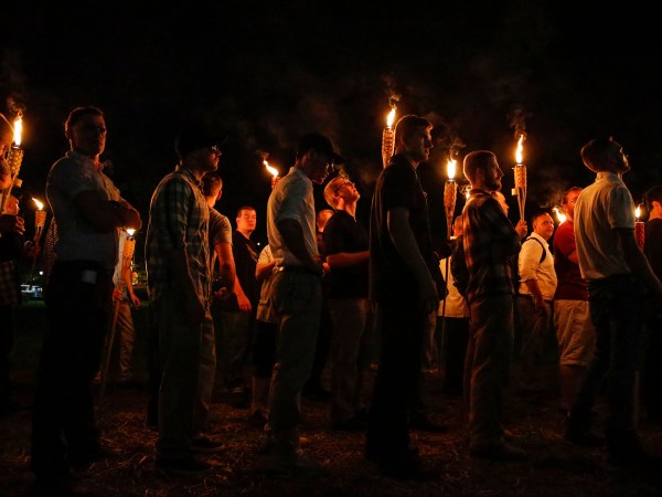 Multiple white nationalist groups march with torches through the UVA campus in Charlottesville on Friday, August 11, 2017. When met by counter protesters, some yelling "Black lives matter," tempers turned into violence. Multiple punches were thrown, pepper spray was sprayed and torches were used as weapons. Mandatory Credit: Mykal McEldowney/IndyStar via USA TODAY NETWORK