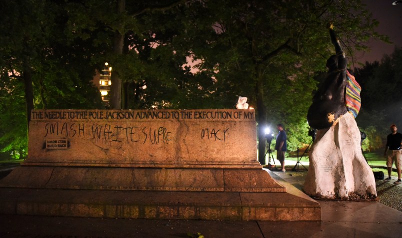 The empty pedestal of the Jackson Lee Monument in Wyman Park is seen before dawn after workers took four Confederate monuments overnight in the city. (Jerry Jackson/Baltimore Sun)