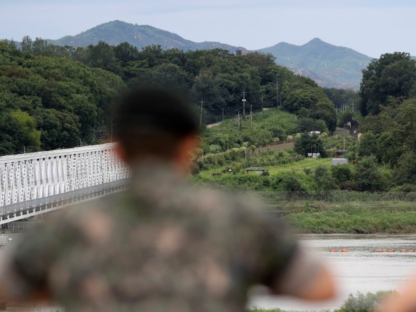 A South Korean soldier watch the north side at the Imjingak Pavilion in Paju, South Korea, Wednesday, Aug. 16, 2017. China has urged the United States and North Korea to "hit the brakes" on threatening words and work toward a peaceful resolution of their tense standoff created by Pyongyang's recent missile tests and threats to fire them toward Guam. The dispute has also raised fears in South Korea, where a conservative political party on Wednesday called for the United States to bring back tactical nuclear weapons to the Korean Peninsula. (AP Photo/Lee Jin-man)
