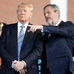 President Donald Trump stands with Liberty University president, Jerry Falwell Jr., right, during commencement ceremonies at the school in Lynchburg, Va., Saturday, May 13, 2017. (AP Photo/Steve Helber)