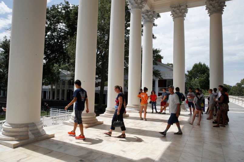 First year students tour the Rotunda of the University of Virginia, Friday, Aug. 18, 2017, in Charlottesville, Va., a week after a white nationalist rally took place on campus. (AP Photo/Jacquelyn Martin)