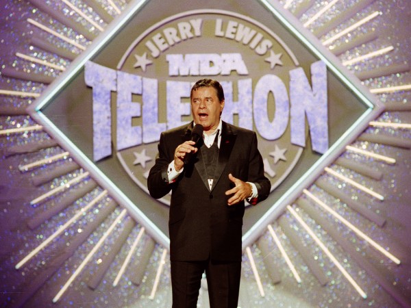 FILE - In this Sept. 2, 1990 file photo, entertainer Jerry Lewis makes his opening remarks at the 25th Anniversary of the Jerry Lewis MDA Labor Day Telethon fundraiser in Los Angeles. MDA said Friday, May 1, 2015, that the Labor Day television fundraising tradition for decades, is ending. Celebrities including Frank Sinatra, John Lennon and Michael Jackson to Pitbull and Jennifer Lopez have performed on the telethon, first hosted by Lewis and Dean Martin in 1956. It moved to Labor Day in 1966. (AP Photo/Julie Markes, File)