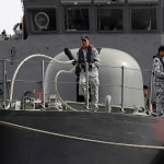 Sailors on the Republic of Singapore Navy's RSS Brave, casts off from a berth at Tuas naval base on a search and rescue mission for USS John S. McCain's 10 missing  sailors on Thursday, Aug. 24, 2017 in Singapore. Aircraft and ships from the navies of Singapore, Malaysia, Indonesia and Australia are searching seas east of Singapore where the collision between USS John S. McCain and an oil tanker happened early Monday. (AP Photo/Wong Maye-E)