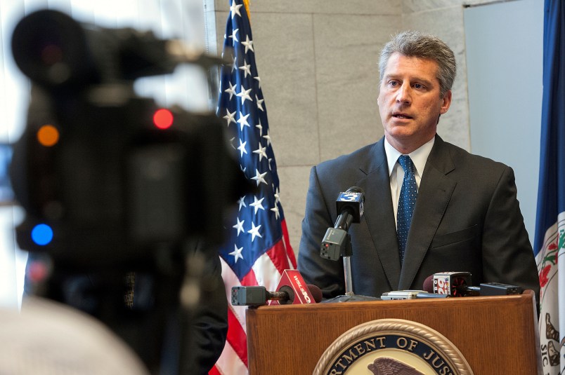 U.S Attorney Tim Heaphy talks about human trafficking in the area after the sentencing of Elin Coello-Ordonez, who smuggled an 18-year-old Honduras woman into the country and forced her to work as a prostitute in brothels in Harrisonburg, Charlottesville, Maryland and Pennsylvania, Wednesday, Oct. 15, 2014 in Harrisonburg, Va. (AP Photo/Daily News-Record, Nikki Fox)