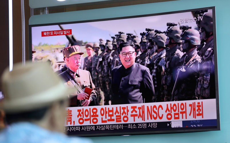 A man watches a TV screen showing a local news program reporting on North Korea's missiles with an image of North Korea's leader Kim Jong Un at the Seoul Train Station in Seoul, South Korea, Saturday, Aug. 26, 2017. Three North Korea short-range ballistic missiles failed on Saturday, U.S. military officials said, which, if true, would be a temporary setback to Pyongyang's rapid nuclear and missile expansion. The banners read "South Korean Presidential Office, National Security Director Chung Eui-yong chaired a National Security Council meeting." (AP Photo/Lee Jin-man)