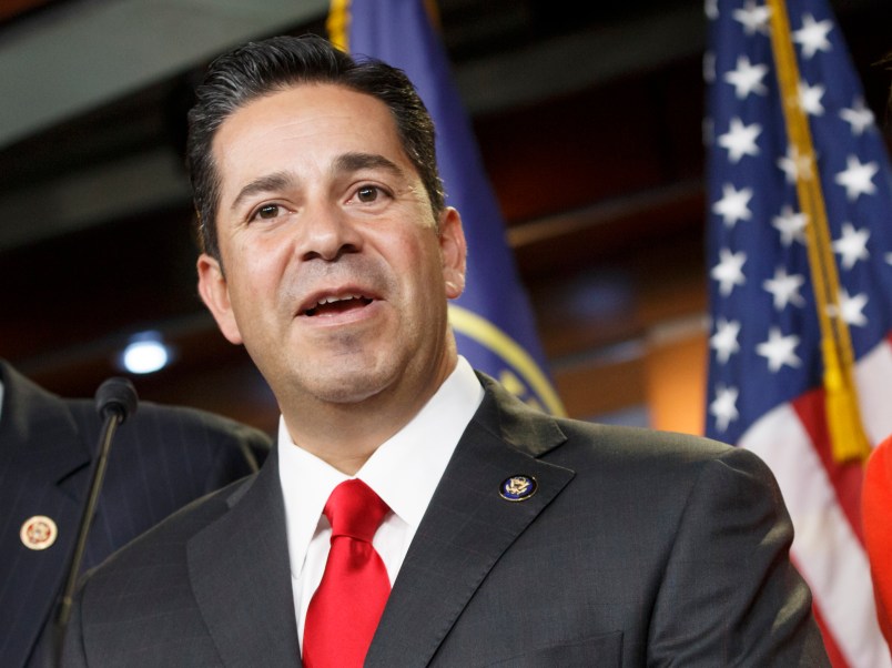 Rep. Ben Ray Lujan, D-N.M., center, thanks House Minority Leader Nancy Pelosi, D-Calif., right, after she announced he will take over as head of the Democratic Congressional Campaign Committee from Rep. Steve Israel, D-N.Y., left, during a news conference at the Capitol in Washington, Monday, Nov. 17, 2014.