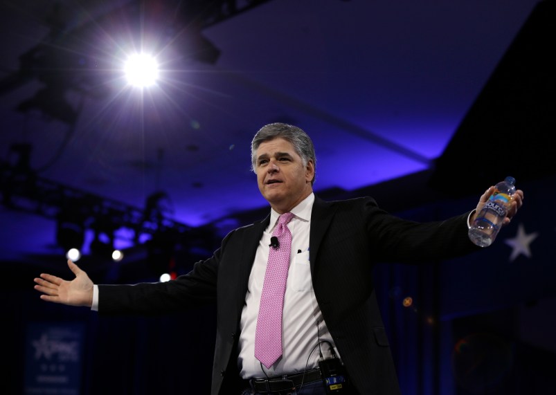 In this March 4, 2016, photo, Sean Hannity of Fox News arrives in National Harbor, Md. Hannity is getting a bruising reminder that this year's presidential campaign defies traditional political rules. The Fox News Channel and radio host had a nasty spat with Ted Cruz this week, following criticism from both the left and right about his interviews with Donald Trump. (AP Photo/Carolyn Kaster)