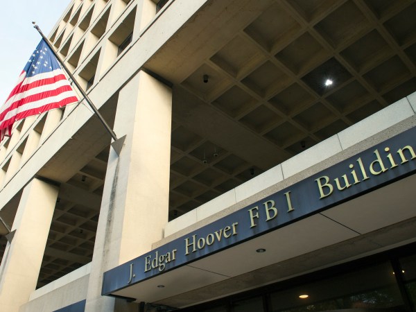 The FBI's J. Edgar Hoover Headquarters, acros the street from the Deparment of Justice, in Washington, Wednesday, Nov. 2, 2016. (AP Photo/Cliff Owen)