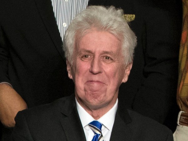 Rep. Lou Barletta, R-Pa., left, Tom Marino, R-Pa., center left, and Jeffrey Lord, right, watch as President-elect Donald Trump, center right, departs a rally in Hershey, Pa., Thursday, Dec. 15, 2016. (AP Photo/Matt Rourke)