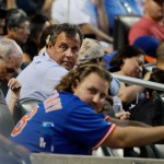 New Jersey Gov. Chris Christie watches during the fourth inning of a baseball game between the New York Mets and the St. Louis Cardinals at Citi Field Tuesday, July 18, 2017, in New York. (AP Photo/Frank Franklin II)
