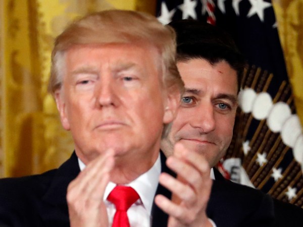 President Donald Trump applauds with House Speaker Paul Ryan of Wis., behind him in the East Room of the White House, Wednesday, July 26, 2017, in Washington. Trump is announcing the first U.S. assembly plant for electronics giant Foxconn in a project that's expected to result in billions of dollars in investment in the state and create thousands of jobs. (AP Photo/Alex Brandon)