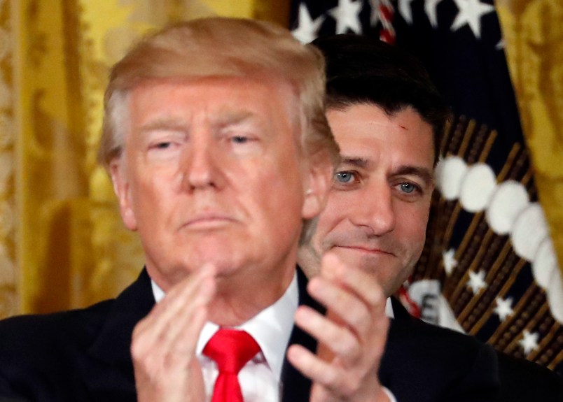 President Donald Trump applauds with House Speaker Paul Ryan of Wis., behind him in the East Room of the White House, Wednesday, July 26, 2017, in Washington. Trump is announcing the first U.S. assembly plant for electronics giant Foxconn in a project that's expected to result in billions of dollars in investment in the state and create thousands of jobs. (AP Photo/Alex Brandon)