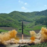 FILE- In this July 4, 2017, file photo distributed by the North Korean government shows what was said to be the launch of a Hwasong-14 intercontinental ballistic missile, ICBM, in North Korea's northwest. North Korea has been condemned and sanctioned for its nuclear ambitions, yet has still received food, fuel and other aid from its neighbors and adversaries for decades. How does the small, isolated country keep getting what it wants and needs to prevent its collapse?(Korean Central News Agency/Korea News Service via AP, File)