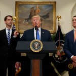 Sen. Tom Cotton, R- Ark., left, and Sen. David Perdue, R-Ga., right, look on as President Donald Trump speaks during the unveiling of legislation that would place new limits on legal immigration, in the Roosevelt Room of the White House, Wednesday, Aug. 2, 2017, in Washington. (AP Photo/Evan Vucci)