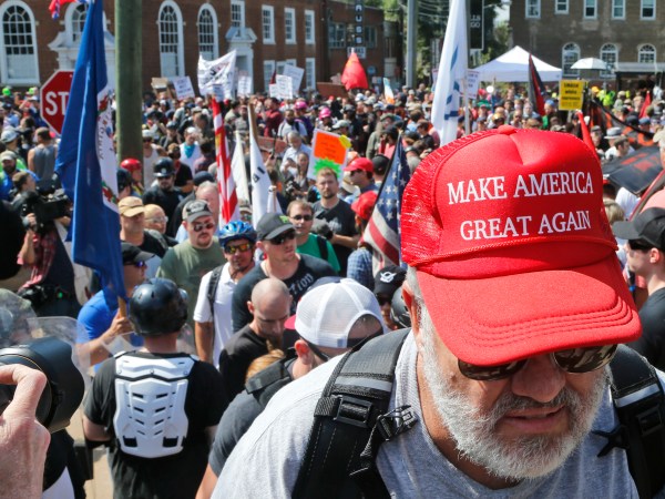 An Alt Right demonstrator walks into Lee Park in Charlottesville, Va., Saturday, Aug. 12, 2017.  (AP Photo/Steve Helber)