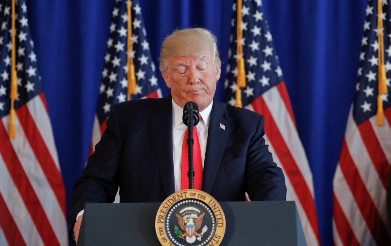 President Donald Trump pauses as he speaks to members of the media regarding the on going situation in Charlottesville, Va., Saturday, Aug. 12, 2017 at Trump National Golf Club in Bedminister, N.J. (AP Photo/Pablo Martinez Monsivais)
