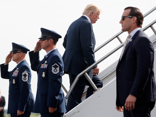 President Donald Trump Boards Air Force One at Morristown Municipal Airport, Monday, Aug. 14, 2017 in Morristown, N.J. Trump is traveling back to White House to sign an executive order at the White House and then later today travels to New York City and will stay through Wednesday. (AP Photo/Pablo Martinez Monsivais)