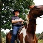 Former Alabama Chief Justice and U.S. Senate candidate Roy Moore, rides in on a horse named "Sassy" to vote a the Gallant Volunteer Fire Department, during the Alabama Senate race, Tuesday, Aug. 15, 2017, in Gallant, Ala. (AP Photo/Brynn Anderson)