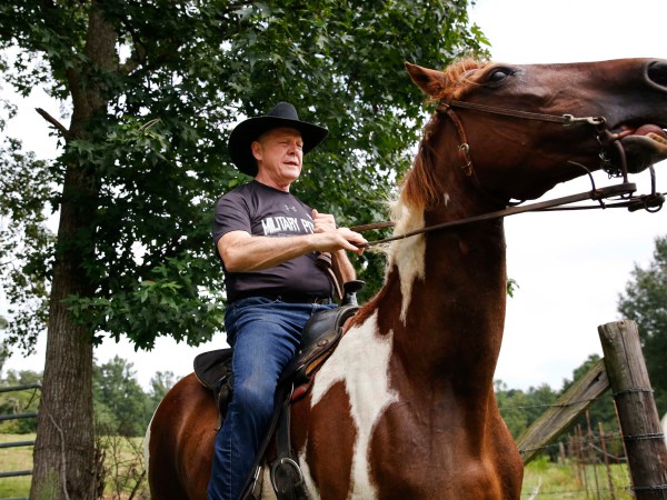 Former Alabama Chief Justice and U.S. Senate candidate Roy Moore, rides in on a horse named "Sassy" to vote a the Gallant Volunteer Fire Department, during the Alabama Senate race, Tuesday, Aug. 15, 2017, in Gallant, Ala. (AP Photo/Brynn Anderson)