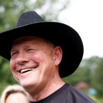 Former Alabama Chief Justice and U.S. Senate candidate Roy Moore, rides in on a horse named "Sassy" to vote a the Gallant Volunteer Fire Department, during the Alabama Senate race, Tuesday, Aug. 15, 2017, in Gallant, Ala. (AP Photo/Brynn Anderson)