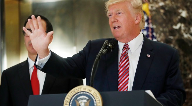 President Donald Trump speaks to the media in the lobby of Trump Tower, Tuesday, Aug. 15, 2017.  (AP Photo/Pablo Martinez Monsivais)