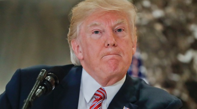 President Donald Trump pauses as he answers questions from members of the media in the lobby of Trump Tower, Tuesday, Aug. 15, 2017.  (AP Photo/Pablo Martinez Monsivais)