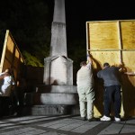 Birmingham city workers covered the Confederate Monument in Linn Park Tuesday night on orders from Mayor William Bell. It took the workers about 45 minutes to erect the 12x16 foot plywood enclosure around the base of the monument. (Joe Songer | jsonger@al.com).