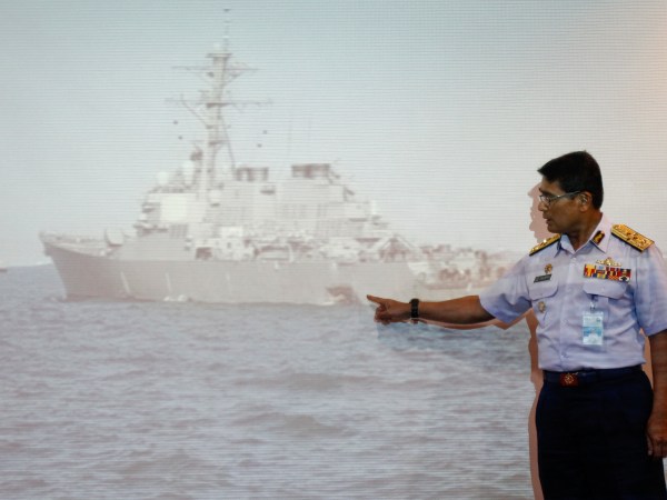 Malaysian Maritime Director Indera Abu Bakar show the damage of USS John S. McCain ship during a press conference in Putrajaya, Malaysia on Monday, Aug. 21, 2017. The U.S. Navy says the USS John S. McCain has arrived at Singapore's naval base with "significant damage" to its hull after a collision early Monday between it and an oil tanker. (AP Photo/Daniel Chan)