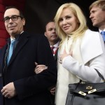 Treasury Secretary-designate Stephen Mnuchin and his fiancee Louise Linton arrive on Capitol Hill in Washington, Friday, Jan. 20, 2017, for the presidential inauguration of Donald Trump. (Saul Loeb/Pool Photo via AP)