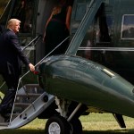 President Donald Trump boards Marine One with first lady Melania Trump on the South Lawn of the White House in Washington, Friday, Aug. 25, 2017, en route to Camp David, Md. (AP Photo/Carolyn Kaster)