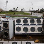 A laundromat's machines sit exposed in the elements after Hurricane Harvey ripped through Rockport, Texas, on Saturday, August 26, 2017. The hurricane hit the Texas coast as a category 4 storm, damaging buildings and leaving tens of thousands without power. NICK WAGNER / AMERICAN-STATESMAN
