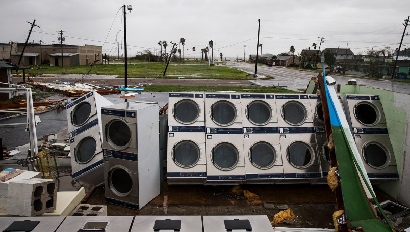 A laundromat's machines sit exposed in the elements after Hurricane Harvey ripped through Rockport, Texas, on Saturday, August 26, 2017. The hurricane hit the Texas coast as a category 4 storm, damaging buildings and leaving tens of thousands without power. NICK WAGNER / AMERICAN-STATESMAN
