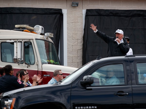 President Donald Trump talks with supporters outside Firehouse 5 where he received a briefing on Hurricane Harvey relief efforts, Tuesday, Aug. 29, 2017, in Corpus Christi, Texas. (AP Photo/Evan Vucci)