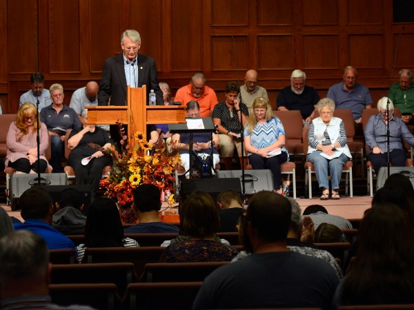 apl082917o/ASECTION/pierre-louis/JOURNAL 082917Clovis Mayor David Lansford,, leads the assembly in prayer during a vigil at Central Baptist Church for the victims of the deadly shooting at the Clovis Carver Public Library in Clovis , NM . Photographed on Tuesday August 29, 2017. .Adolphe Pierre-Louis/JOURNAL