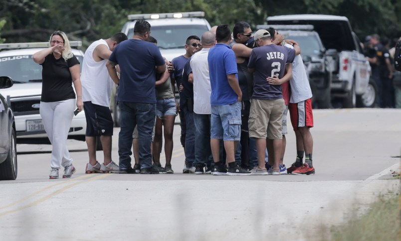 Family members react as a van is pulled out of the Greens Bayou with the bodies of six family members on Wednesday, Aug. 30, 2017, in Houston. The van was carried into the bayou during Tropical Storm Harvey as the water went over the bridge.  ( Elizabeth Conley / Houston Chronicle )