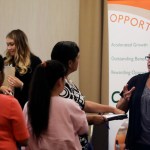 ***ATTN Swayne Hall *** Kathy Tringali, at right, a recruiter for retailer Big 5 talks to job seekers during a job fair Thursday, Aug. 24, 2017, in San Jose, Calif. (AP Photo/Marcio Jose Sanchez)