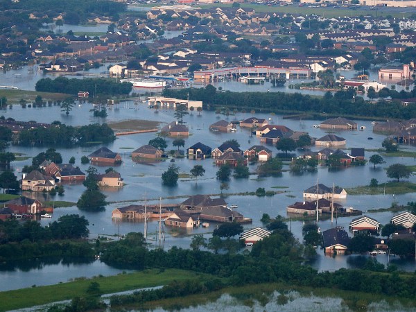 Flooding from Tropical Storm Harvey can be seen in this aerial photo over Port Arthur, Texas, Thursday, Aug. 31, 2017. (AP Photo/Gerald Herbert)