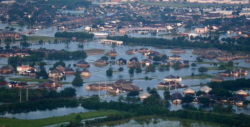 Flooding from Tropical Storm Harvey can be seen in this aerial photo over Port Arthur, Texas, Thursday, Aug. 31, 2017. (AP Photo/Gerald Herbert)