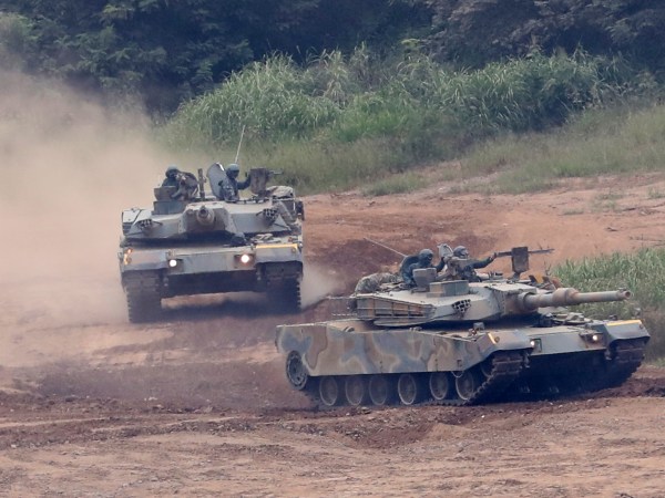 South Korean army's K-1 tanks move during a military exercise in Paju, South Korea, Tuesday, Sept. 5, 2017.  South Korean warships conducted live-fire exercises at sea Tuesday as Seoul continued its displays of military capability following U.S. warnings of a "massive military response" after North Korea detonated its largest-ever nuclear test explosion. (AP Photo/Lee Jin-man)