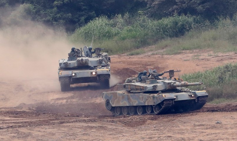 South Korean army's K-1 tanks move during a military exercise in Paju, South Korea, Tuesday, Sept. 5, 2017.  South Korean warships conducted live-fire exercises at sea Tuesday as Seoul continued its displays of military capability following U.S. warnings of a "massive military response" after North Korea detonated its largest-ever nuclear test explosion. (AP Photo/Lee Jin-man)