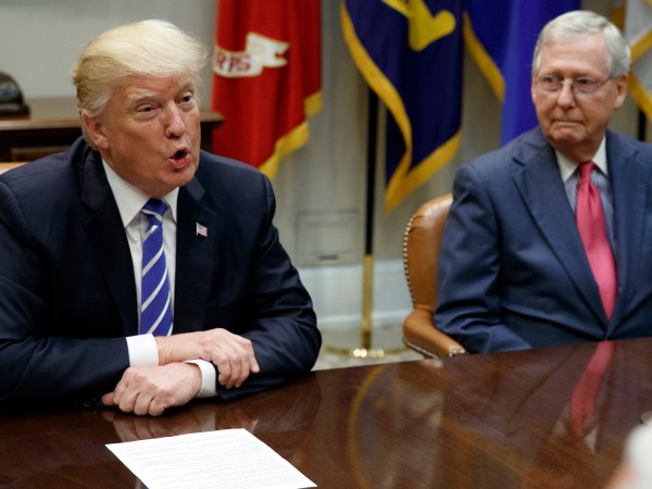 Senate Majority Leader Mitch McConnell, R-Ky., right, looks on as President Donald Trump speaks during a meeting with Congressional leaders and administration officials on tax reform, in the Roosevelt Room of the White House, Tuesday, Sept. 5, 2017, in Washington. (AP Photo/Evan Vucci)