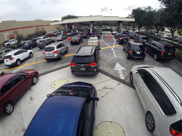 Drivers wait in line for gasoline at the Costco in Altamonte Springs, Fla., ahead of the anticipated arrival of Hurricane Irma,  Wednesday, Sept. 6, 2017. (Joe Burbank/Orlando Sentinel)  3017048