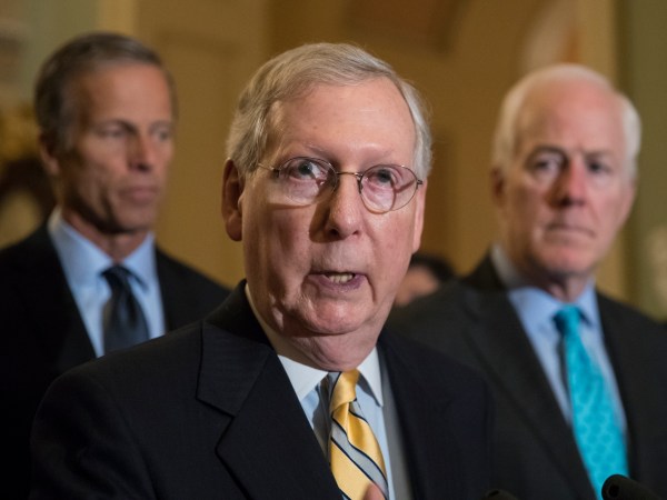 Senate Majority Leader Mitch McConnell, R-Ky., flanked by Sen. John Thune, R-S.D., left, and Majority Whip John Cornyn, R-Texas, holds a news conference at the Capitol after President Donald Trump overruled congressional Republicans and his own treasury secretary and cut a deal with Democrats to fund the government and raise the federal borrowing limit for three months, all part of an agreement to speed money to Harvey relief, in Washington, Wednesday, Sept. 6, 2017.    (AP Photo/J. Scott Applewhite)