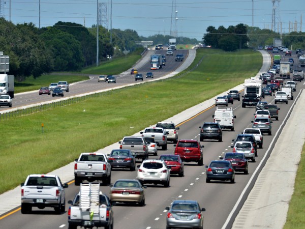 Northbound traffic, right, on I-75 through Sarasota, Florida is heavier than normal, but still moving on Thursday, Sept. 7, 2017.  Many South Florida residents are evacuating and heading north as Hurricane Irma approaches.  (AP Photo/mbr/Sarasota Herald-Tribune/Mike Lang) OUT CHARLOTTE SUN, OUT BRADENTON HERALD, MAGS OUT, TV OUT