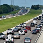 Northbound traffic, right, on I-75 through Sarasota, Florida is heavier than normal, but still moving on Thursday, Sept. 7, 2017.  Many South Florida residents are evacuating and heading north as Hurricane Irma approaches.  (AP Photo/mbr/Sarasota Herald-Tribune/Mike Lang) OUT CHARLOTTE SUN, OUT BRADENTON HERALD, MAGS OUT, TV OUT